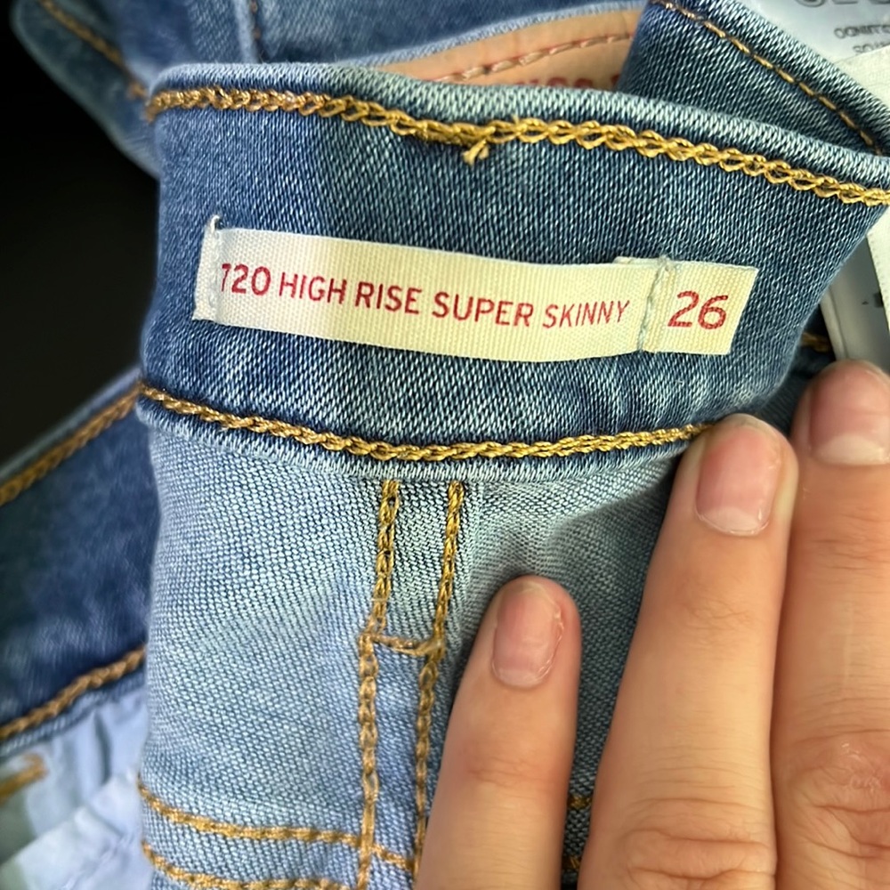 Levi High Rise Super Skinny Size 26